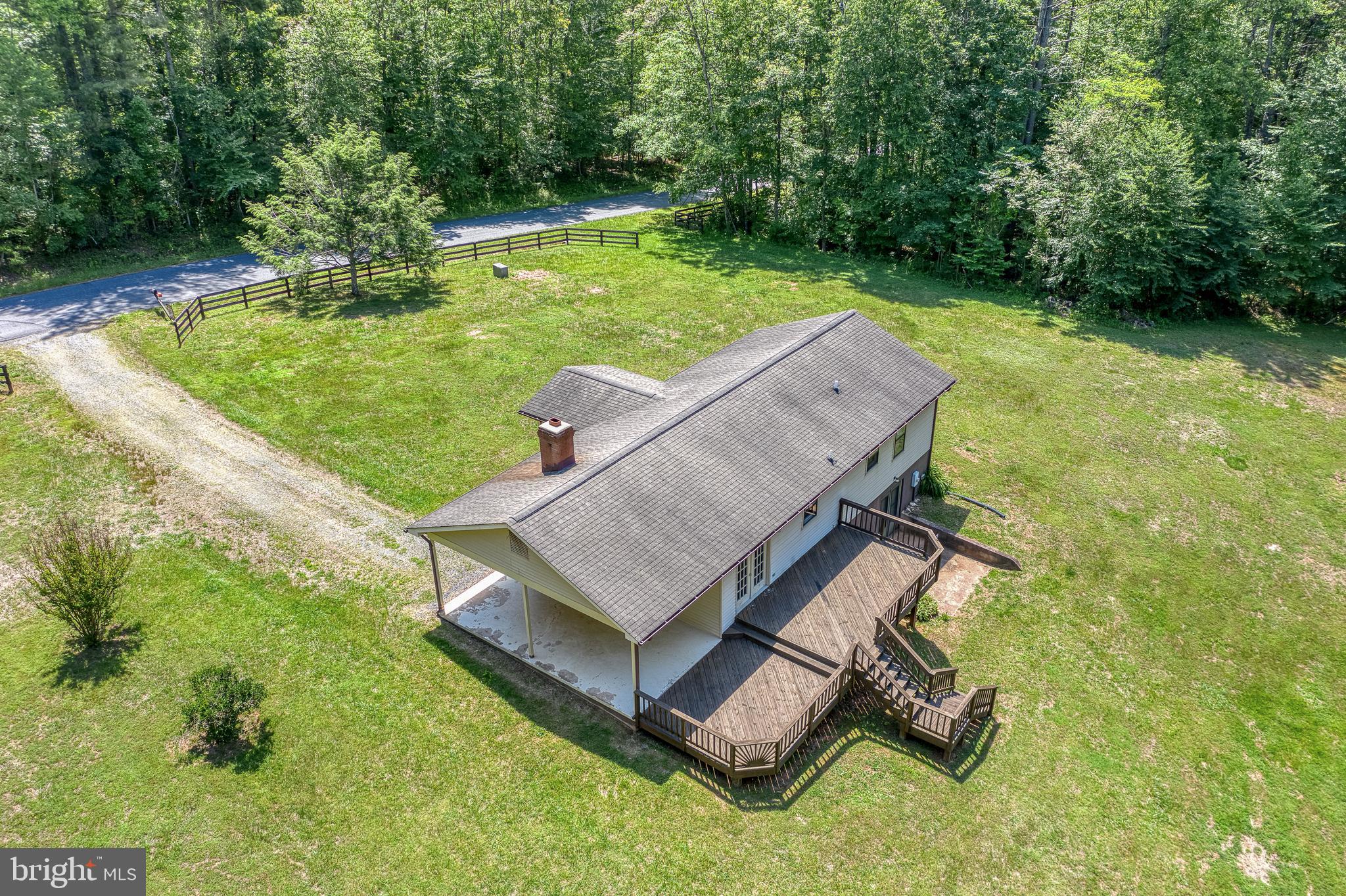 803 Weaver Hollow Road Banco, VA 22711 - Photo 43 of 67 an aerial view of a house with swimming pool and garden