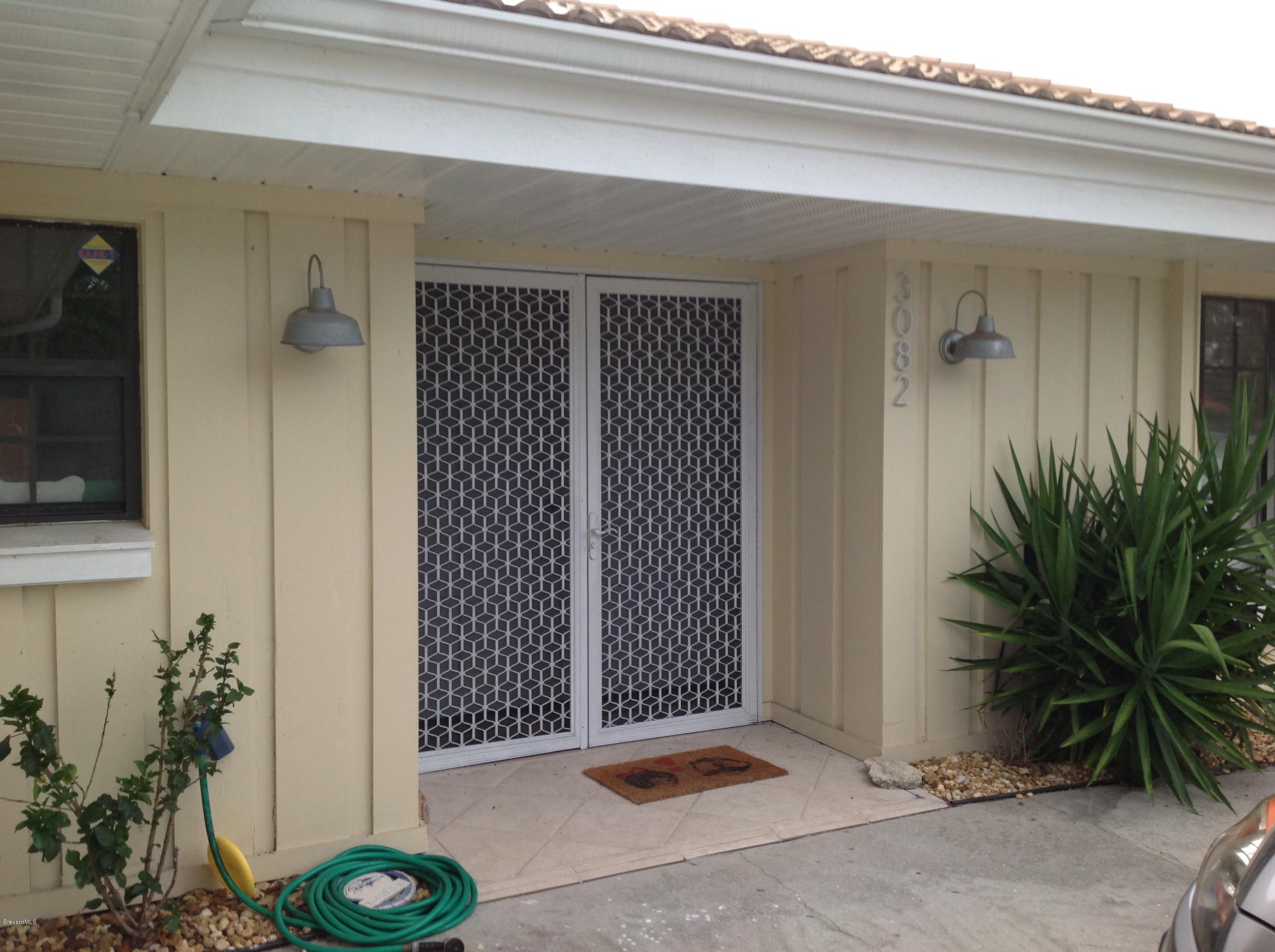 3082 Rio Bonita Street Melbourne, FL 32903 - Photo 3 of 27 Double entry front doors