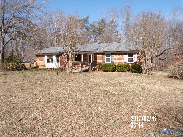14105 Bethany Church Road Montpelier, VA 23192 - Photo 2 of 20 a front view of house with yard and trees