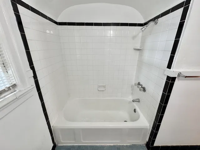 a bathroom with a bathtub