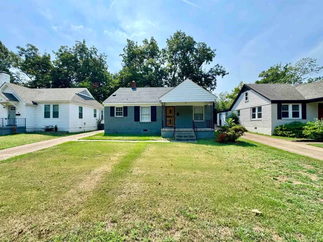 a front view of a house with swimming pool