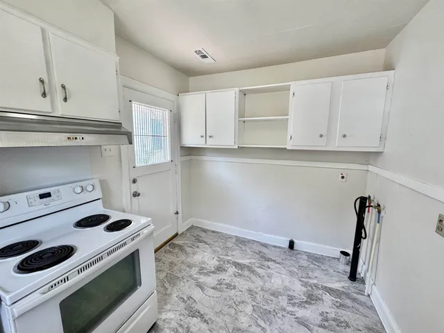 a room with storage and utility