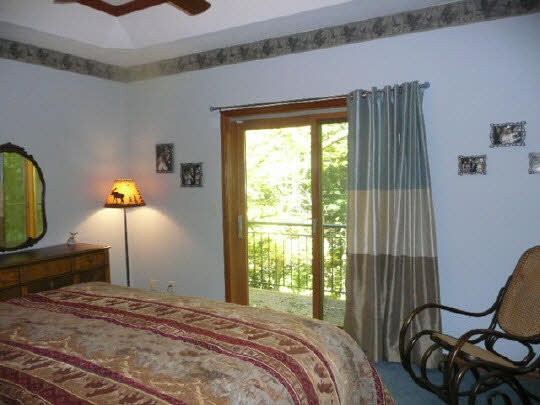 3328 South Seldom Scene Road Oregon, IL 61061 - Photo 11 of 11 a bedroom with a bed a table and chair