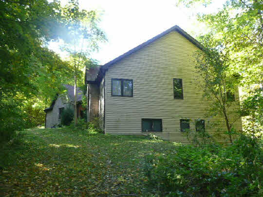 3328 South Seldom Scene Road Oregon, IL 61061 - Photo 2 of 11 a backyard of a house with lots of green space