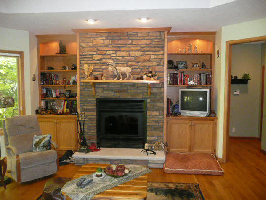 3328 South Seldom Scene Road Oregon, IL 61061 - Photo 5 of 11 a living room with furniture and a fireplace