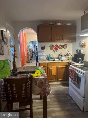 a kitchen with lots of counter top space and appliances