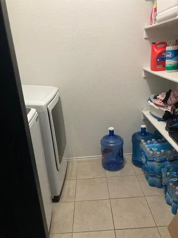 a bathroom with a toilet and a sink