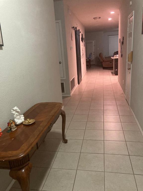 7416 Boat Wind Road Fort Worth, TX 76179 - Photo 2 of 18 a view of kitchen with furniture and a refrigerator