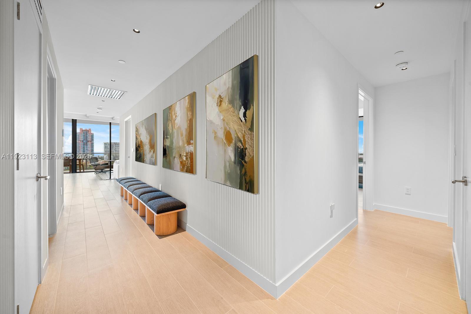 500 Alton Road, Unit 1601 Miami Beach, FL 33139 - Photo 13 of 21 a view of livingroom with furniture and floor to ceiling window