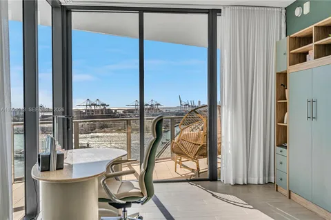 a balcony with furniture and city view