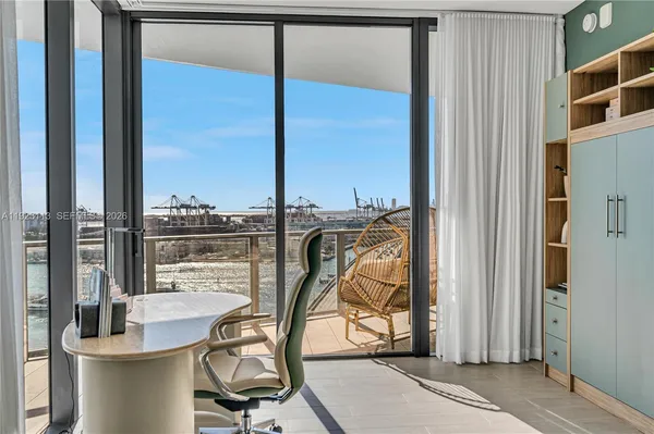 an outdoor living room with patio a city view