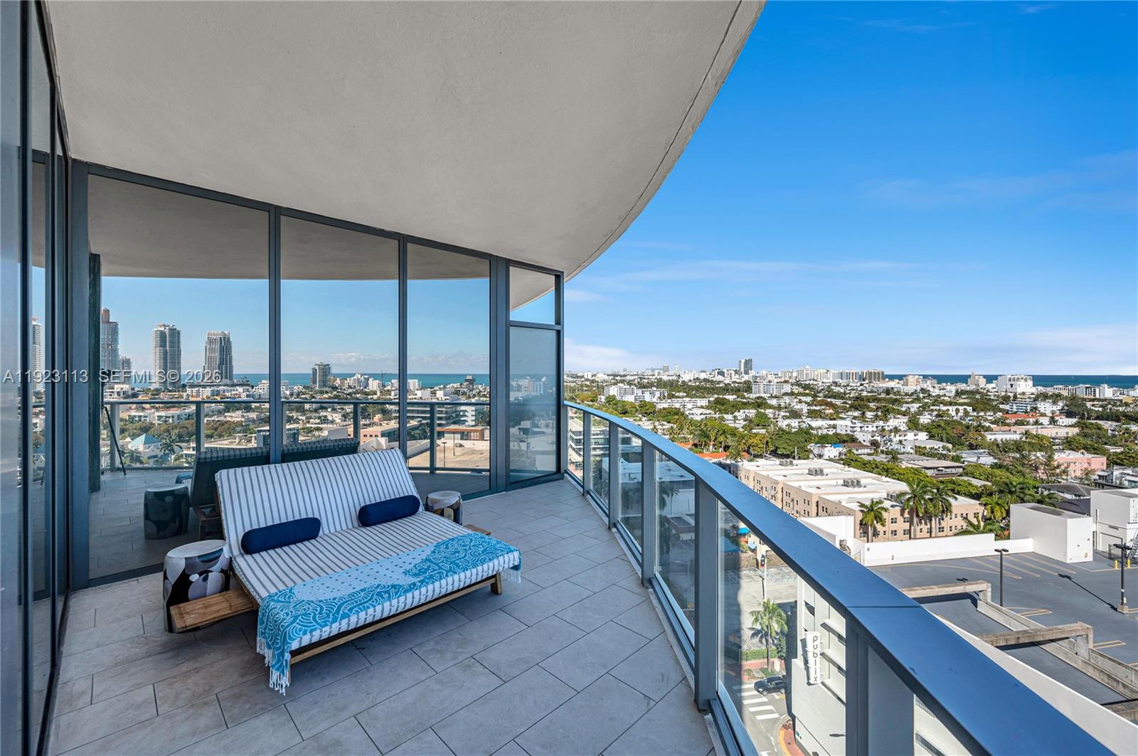 500 Alton Road, Unit 1601 Miami Beach, FL 33139 - Photo 30 of 47 a balcony with furniture and city view
