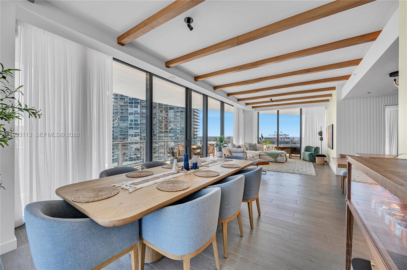 500 Alton Road, Unit 1601 Miami Beach, FL 33139 - Photo 8 of 47 a view of a dining room with furniture and window