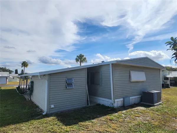a front view of house with yard