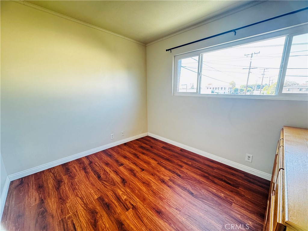 1718 Vine Street, Unit C Alhambra, CA 91801 - Photo 6 of 9 a view of wooden floor and brick walls