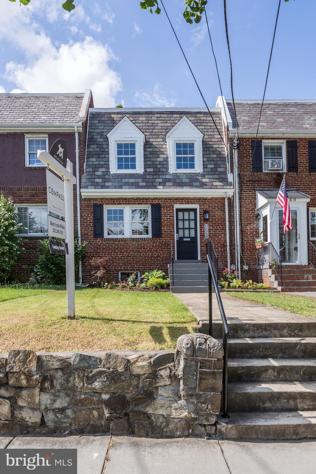a front view of house with a yard