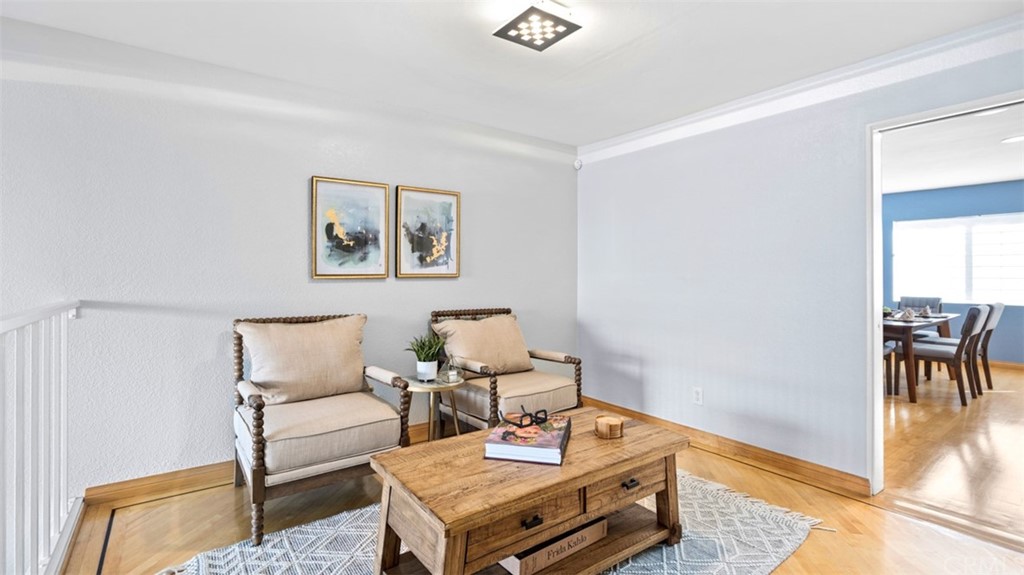 4555 Alla Road, Unit 3 Marina del Rey, CA 90292 - Photo 7 of 26 a living room with furniture and a table