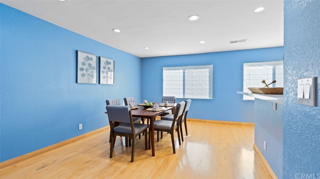 4555 Alla Road, Unit 3 Marina del Rey, CA 90292 - Photo 10 of 26 a view of a dining room with furniture and wooden floor