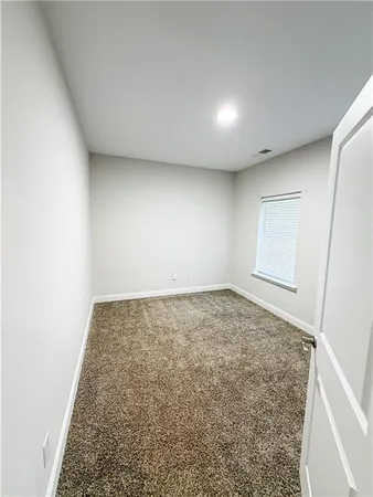 an empty room with a natural light