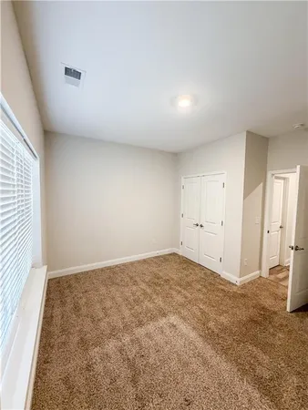 an empty room with a natural light