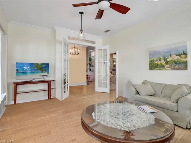 an aerial view of residential building and lake