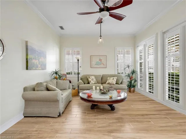 a sign that is sitting on a wooden floor