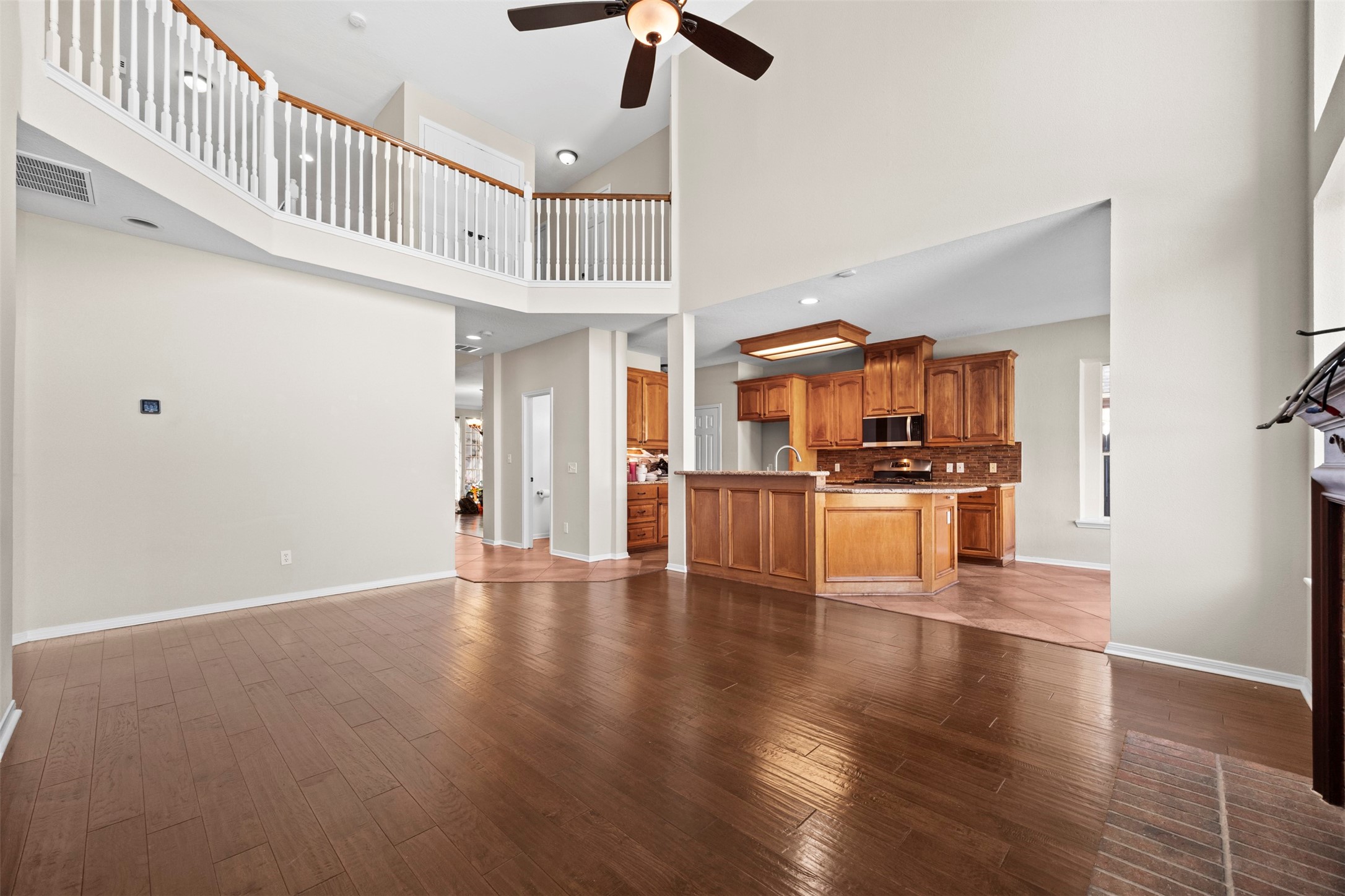 11118 Sprucedale Court Houston, TX 77070 - Photo 12 of 45 a view interior of kitchen and dining room with wooden floor