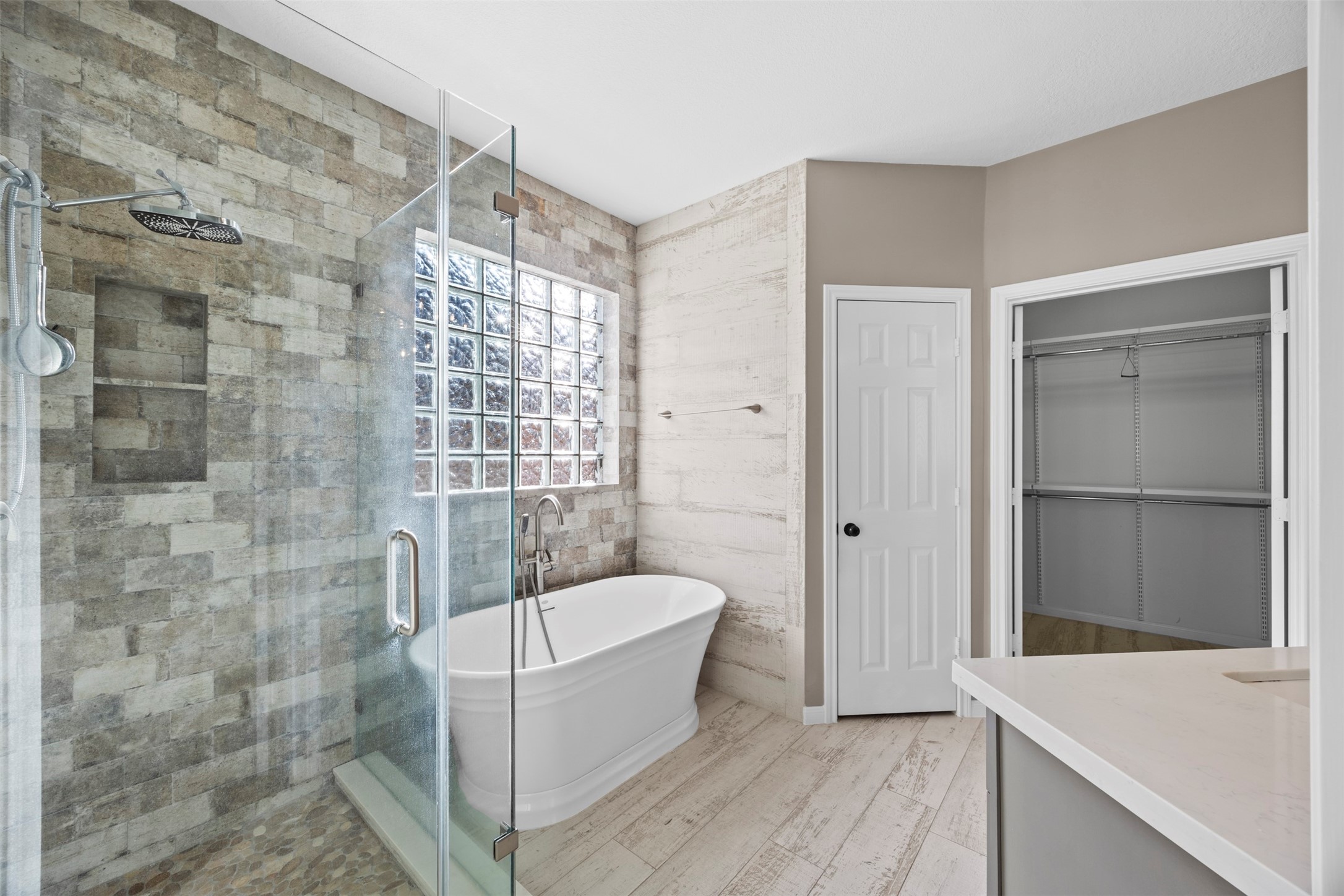 11118 Sprucedale Court Houston, TX 77070 - Photo 16 of 45 a bathroom with a bathtub and shower