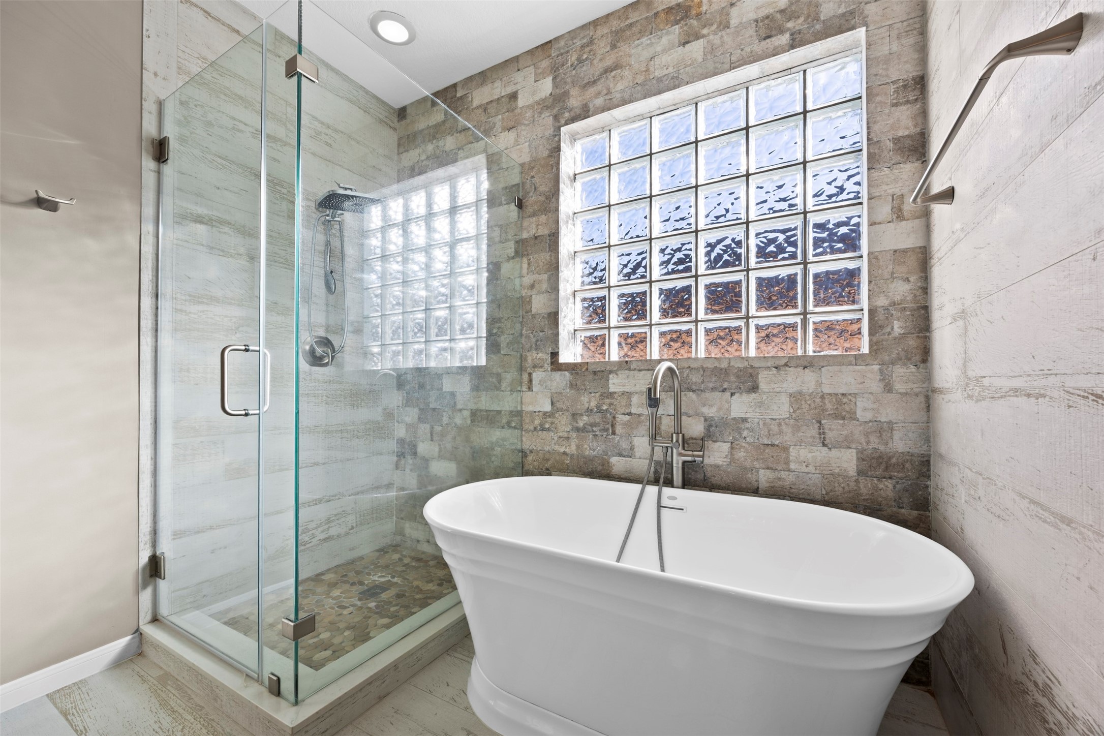 11118 Sprucedale Court Houston, TX 77070 - Photo 17 of 45 a white bath tub sitting next to a shower