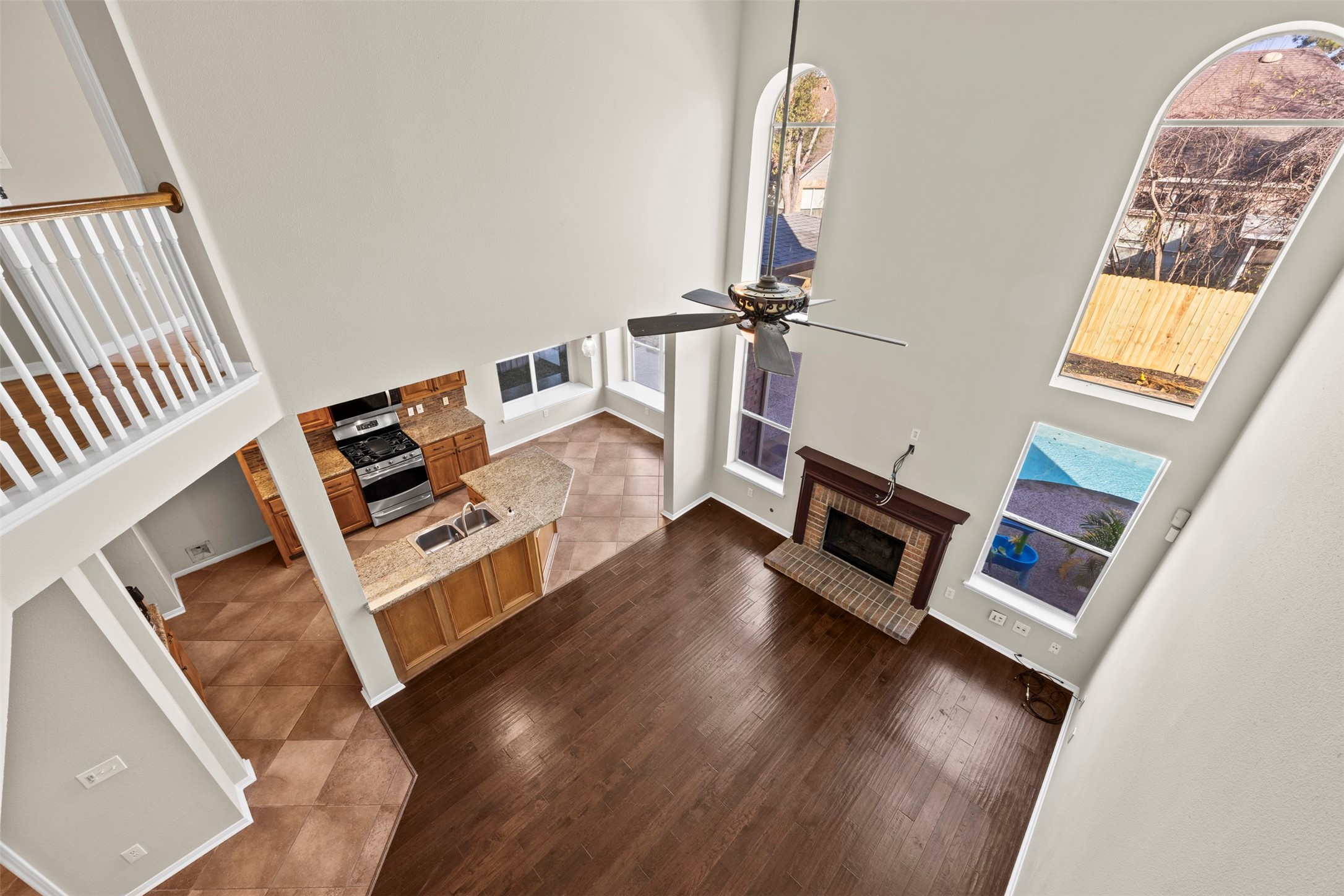 11118 Sprucedale Court Houston, TX 77070 - Photo 20 of 45 a living room with furniture and a fireplace