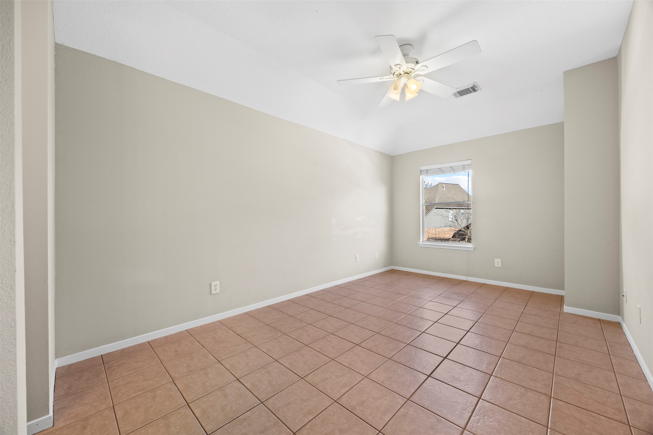 11118 Sprucedale Court Houston, TX 77070 - Photo 29 of 45 a view of an empty room and window