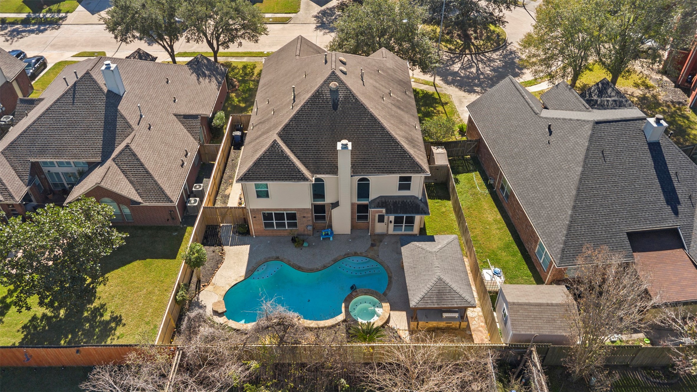 11118 Sprucedale Court Houston, TX 77070 - Photo 41 of 45 an aerial view of a house with swimming pool garden and patio