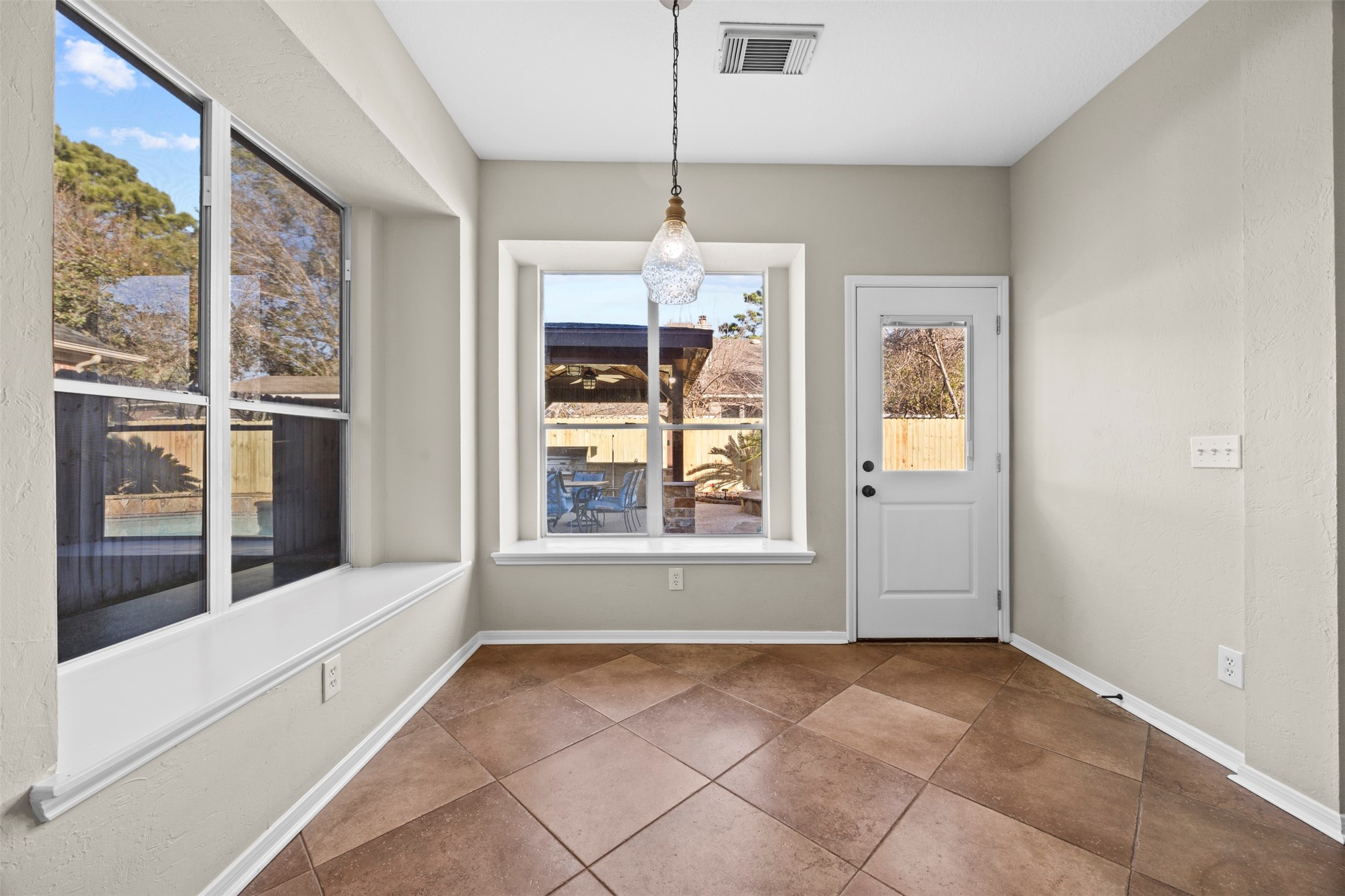 11118 Sprucedale Court Houston, TX 77070 - Photo 7 of 45 a view of an empty room with a window