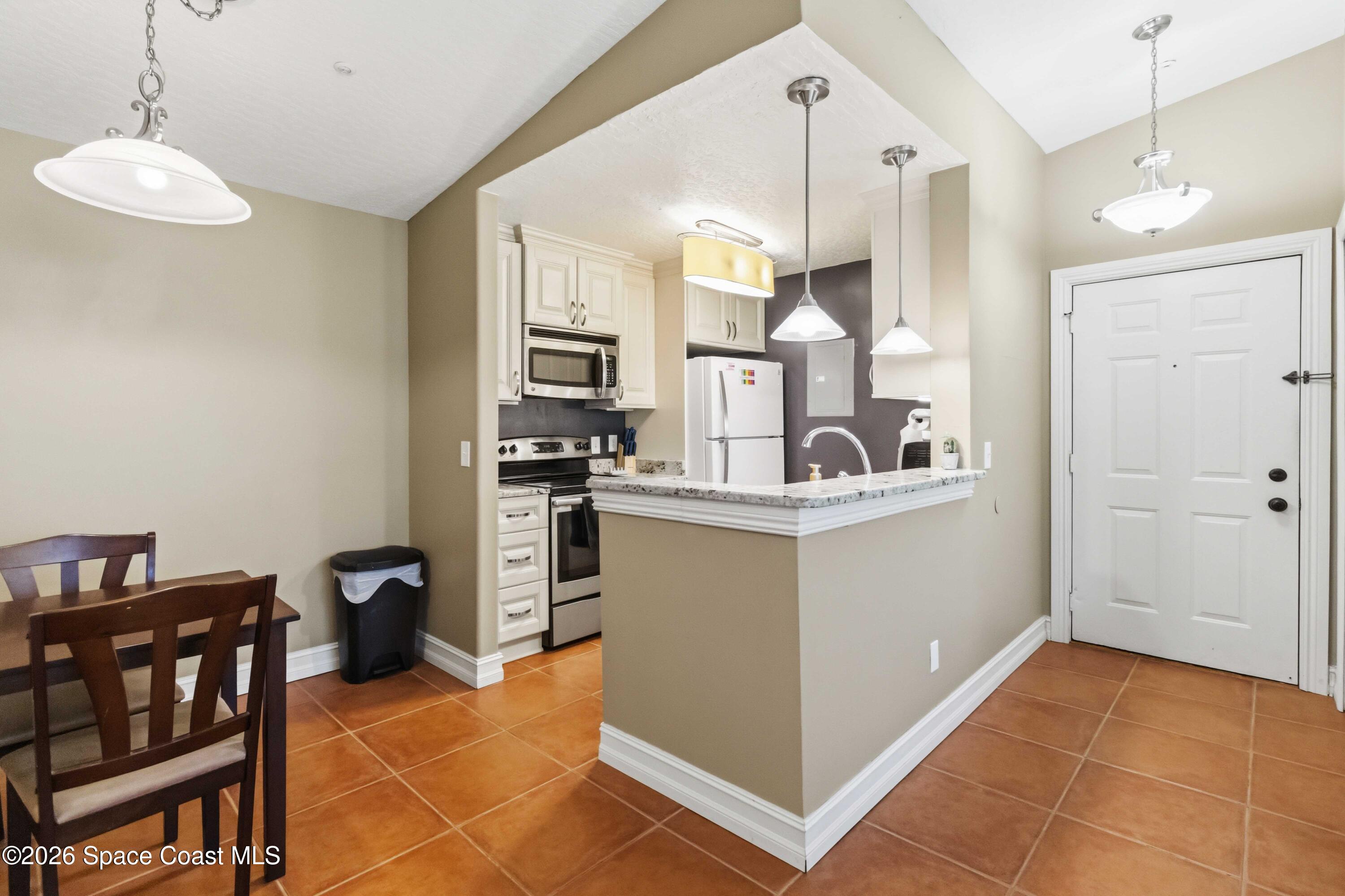 7667 North Wickham Road, Unit 519 Melbourne, FL 32940 - Photo 5 of 18 Remodeled & upgraded kitchen