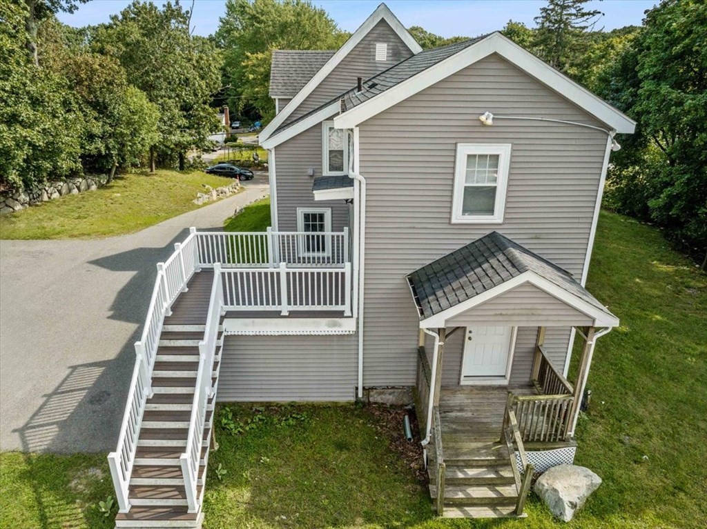 156 Allen Street Randolph, MA 02368 - Photo 21 of 26 a front view of a house with a yard