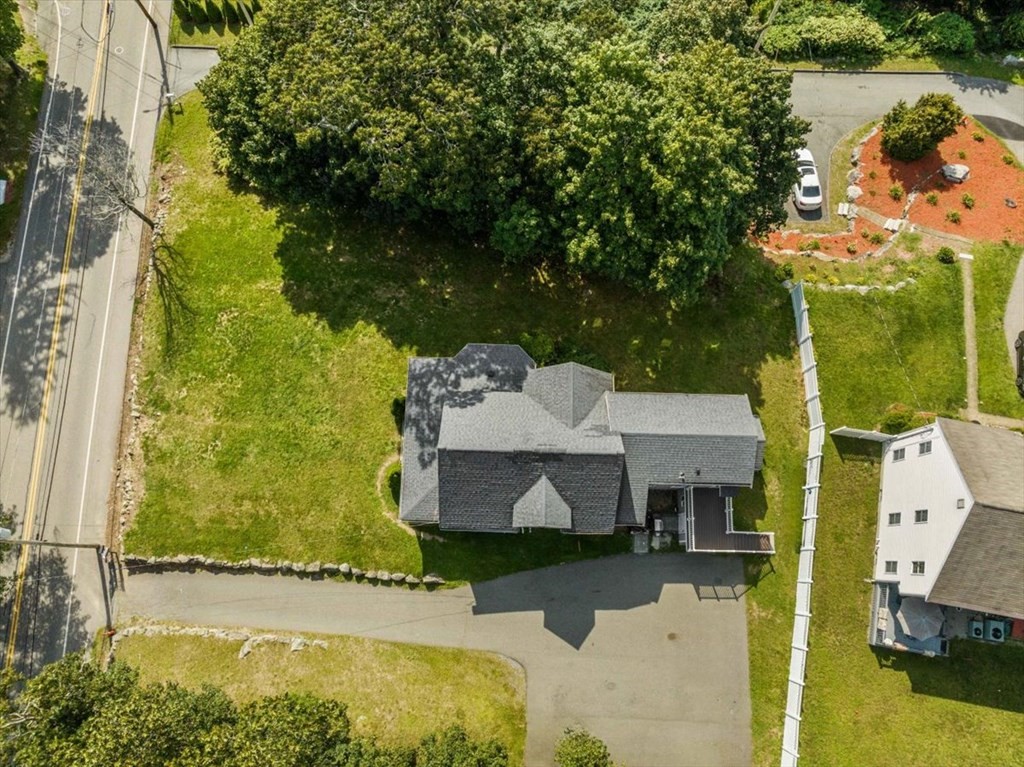 156 Allen Street Randolph, MA 02368 - Photo 25 of 26 an aerial view of a house with swimming pool and large trees