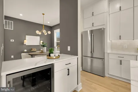 a view of a refrigerator in kitchen