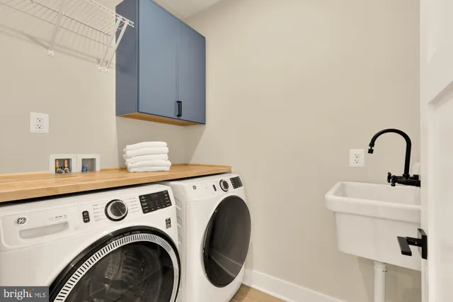 a bathroom with a shower toilet and a tub