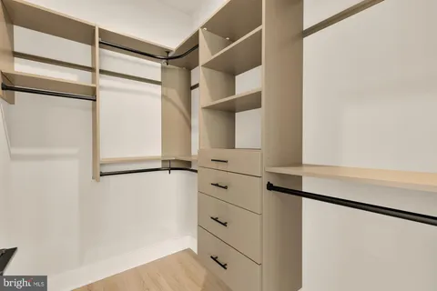 a white bath tub sitting next to a window