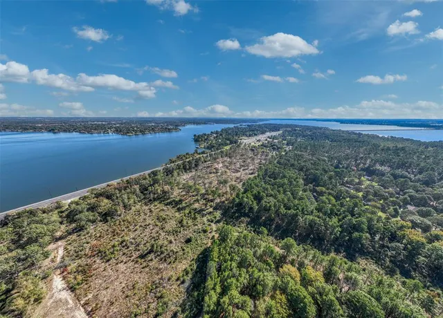 a view of a lake from a yard