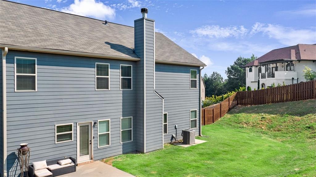 4906 Zoya Court Atlanta, GA 30331 - Photo 20 of 22 a view of backyard with a garden and deck