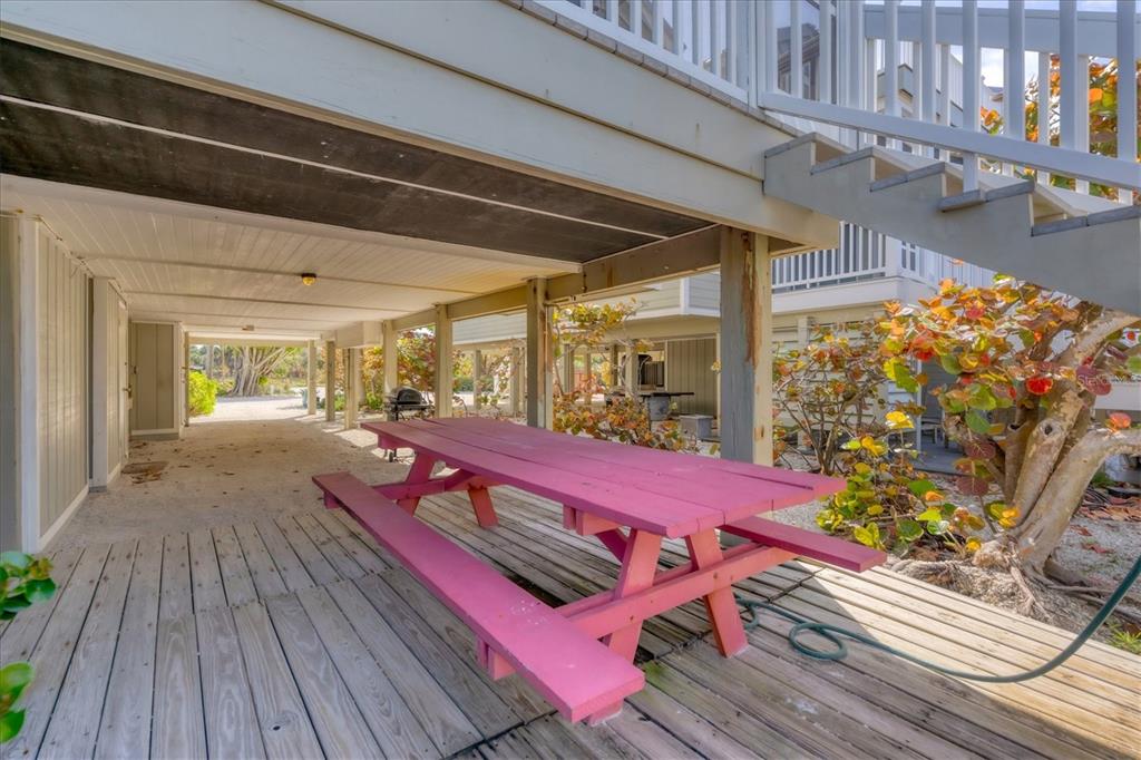 480 Gulf Boulevard, Unit 6 Boca Grande, FL 33921 - Photo 41 of 49 a view of a patio with wooden floor