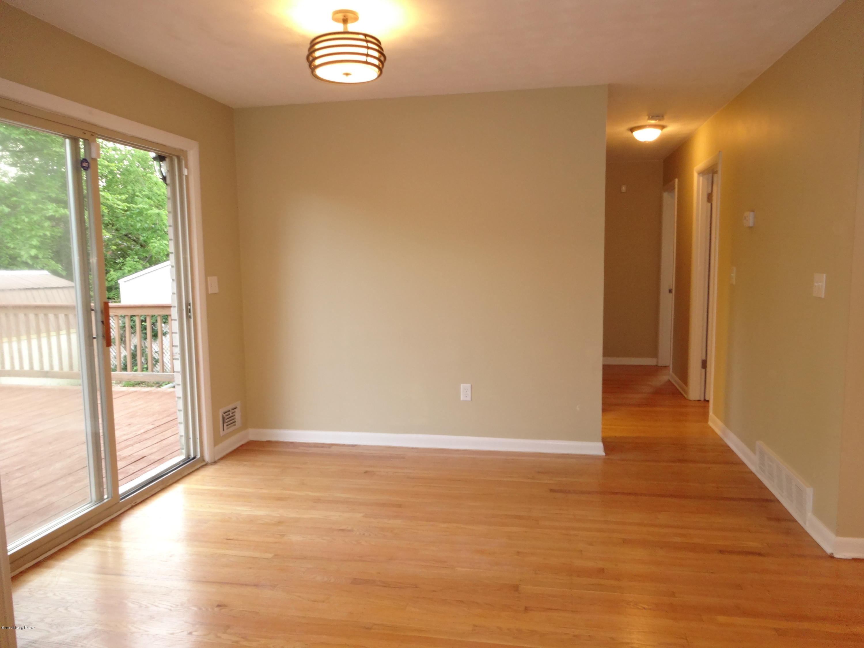 FORMAL DINING AREA W/ ENTRANCE TO HUGE DECK