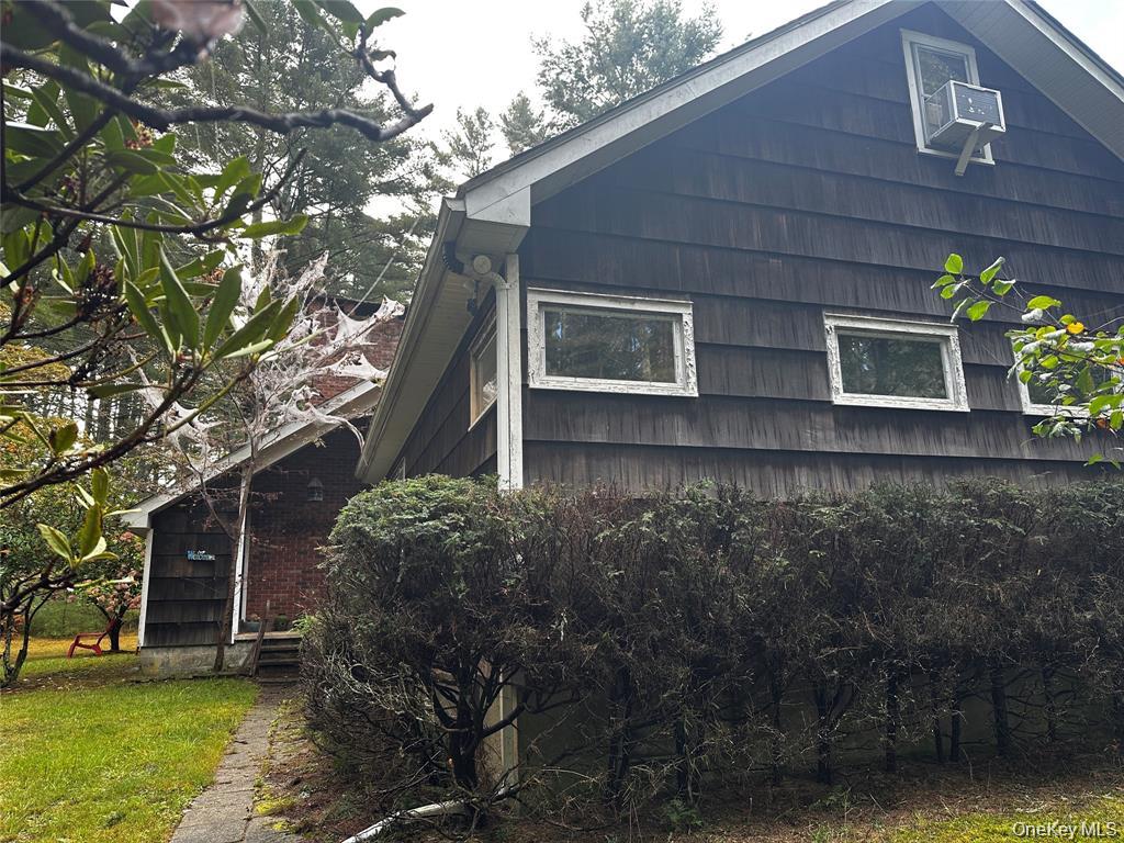 90 Hillside Road Barryville, NY 12719 - Photo 2 of 39 a backyard of a house with lots of green space