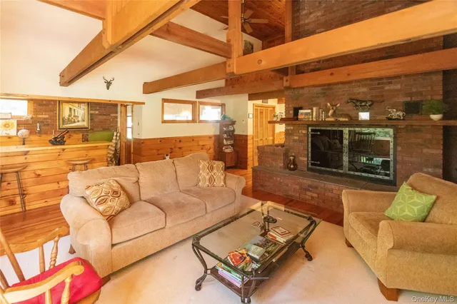 a view of a living room with furniture