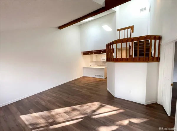 a view of a hallway with staircase