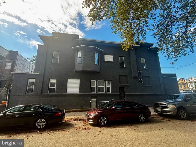 a car parked in front of a house