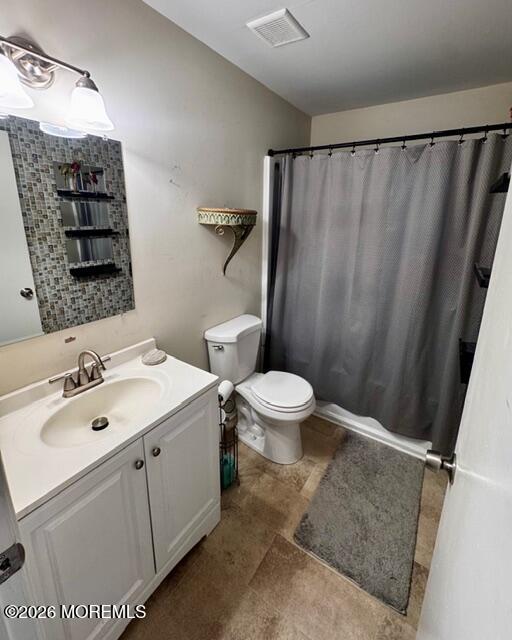 4 Dogwood Road Manahawkin, NJ 08050 - Photo 19 of 28 a bathroom with a sink a toilet and shower
