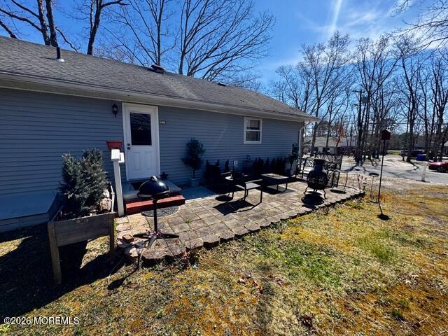 4 Dogwood Road Manahawkin, NJ 08050 - Photo 25 of 28 a view of backyard of house with outdoor seating