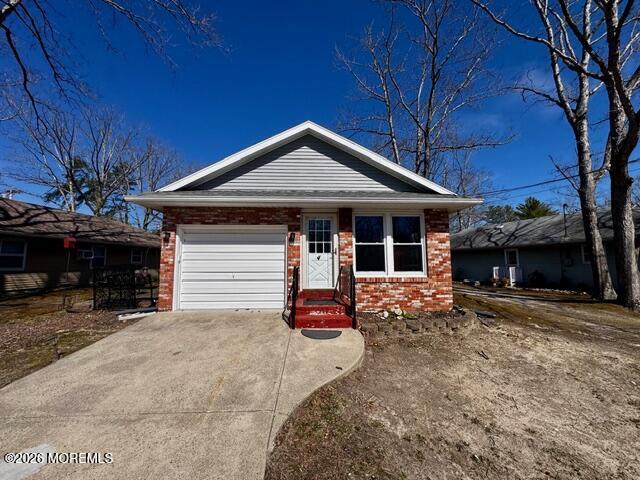 4 Dogwood Road Manahawkin, NJ 08050 - Photo 3 of 28 a front view of a house with yard